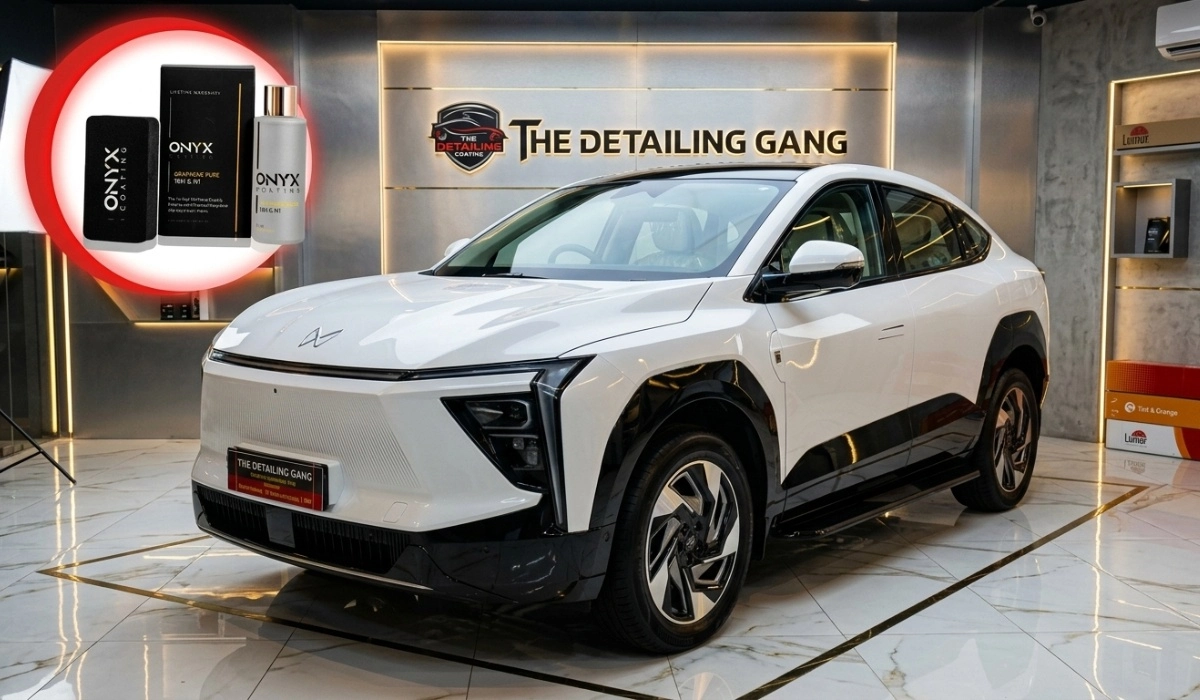 Professional ceramic coating installation on car